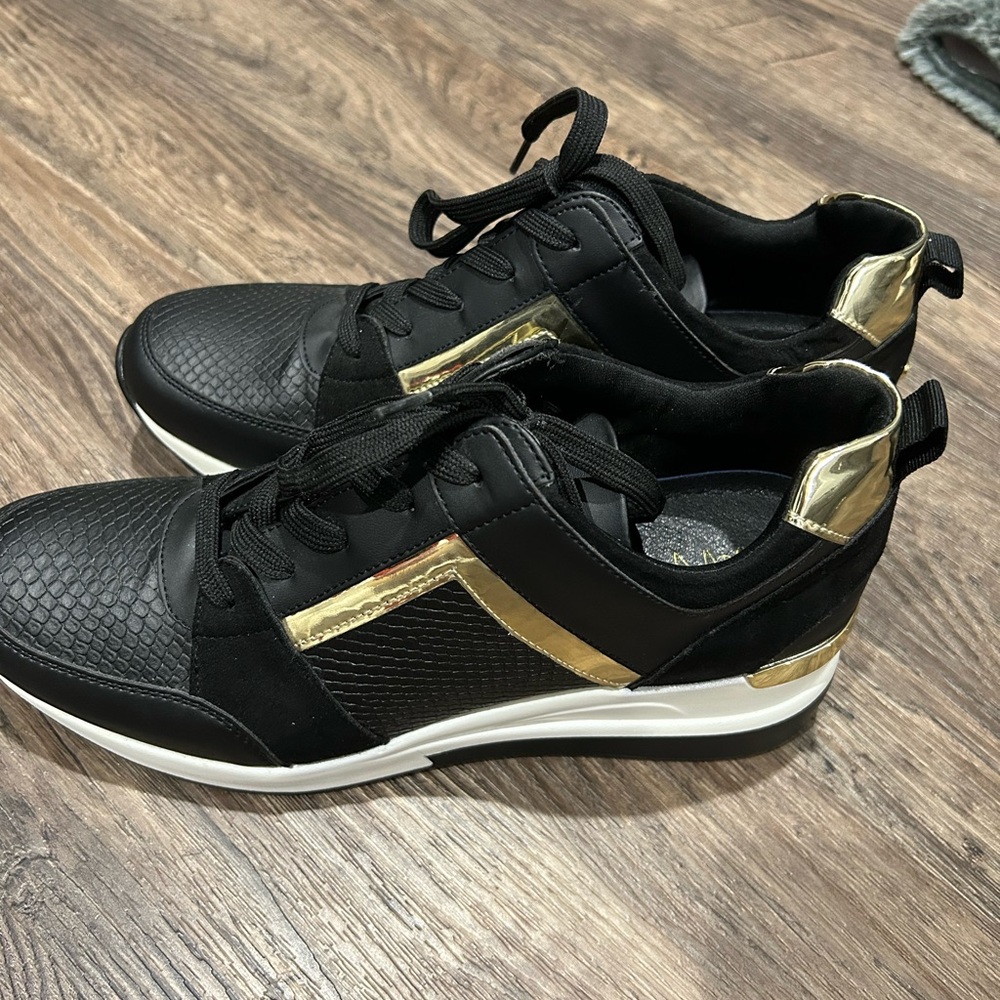IMAN Black and Gold Women's Sneakers